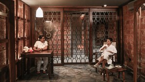 A traditional room with wooden walls, a patterned floor, and a partition with a geometric design. - Storii by ITC Hotels Shanti Morada Saligao, Goa (Saligao)