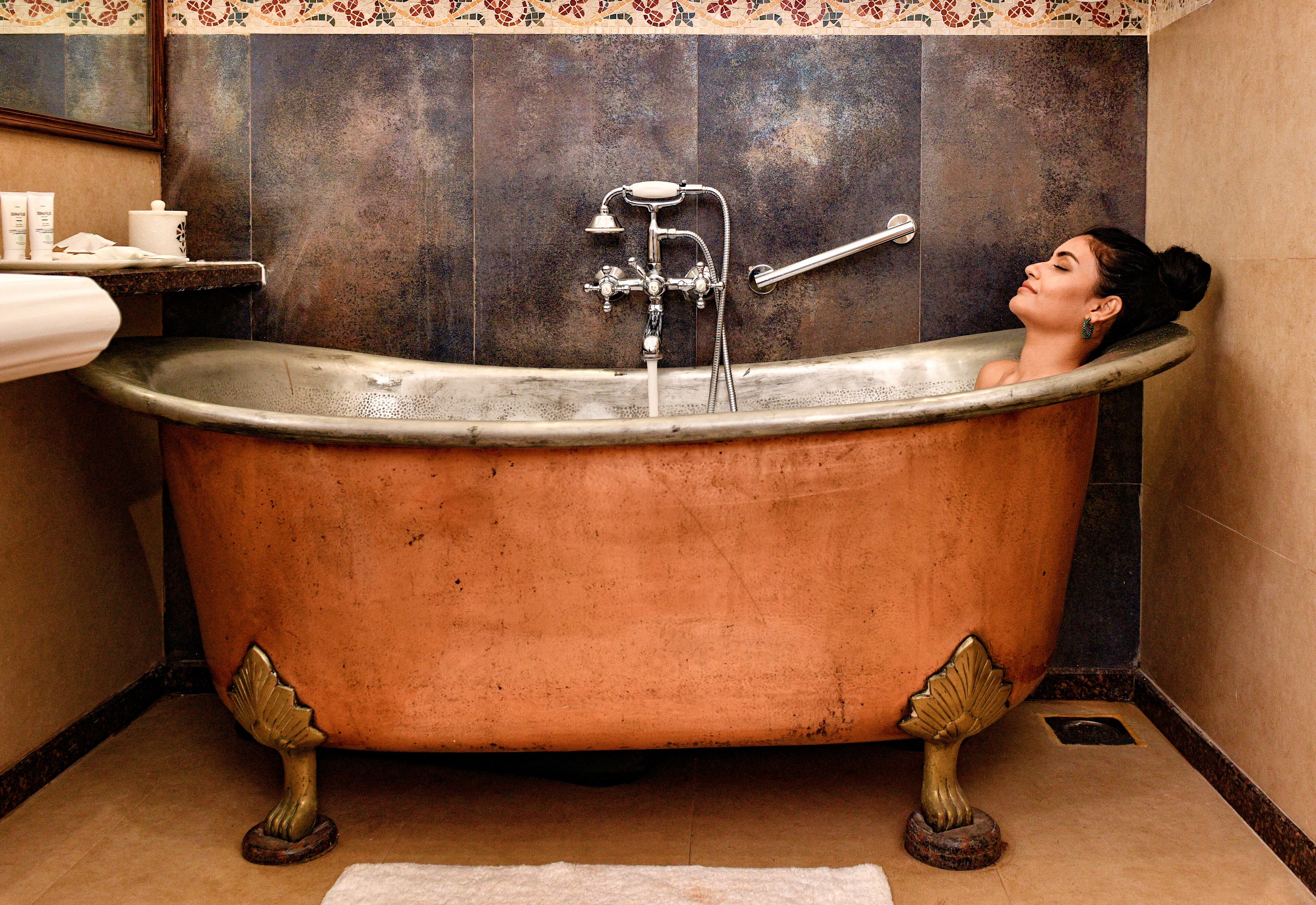 separate bathtub and shower, jetted bath, rainfall showerhead