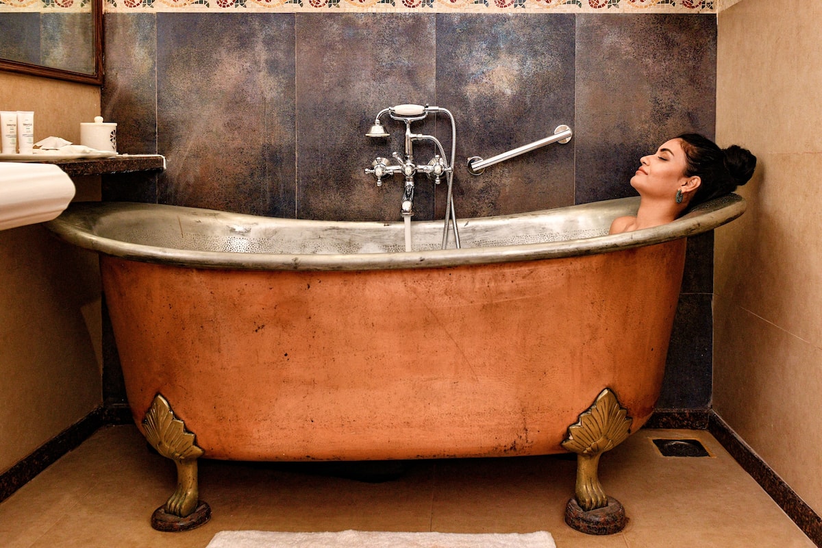 separate bathtub and shower, jetted bath, rainfall showerhead