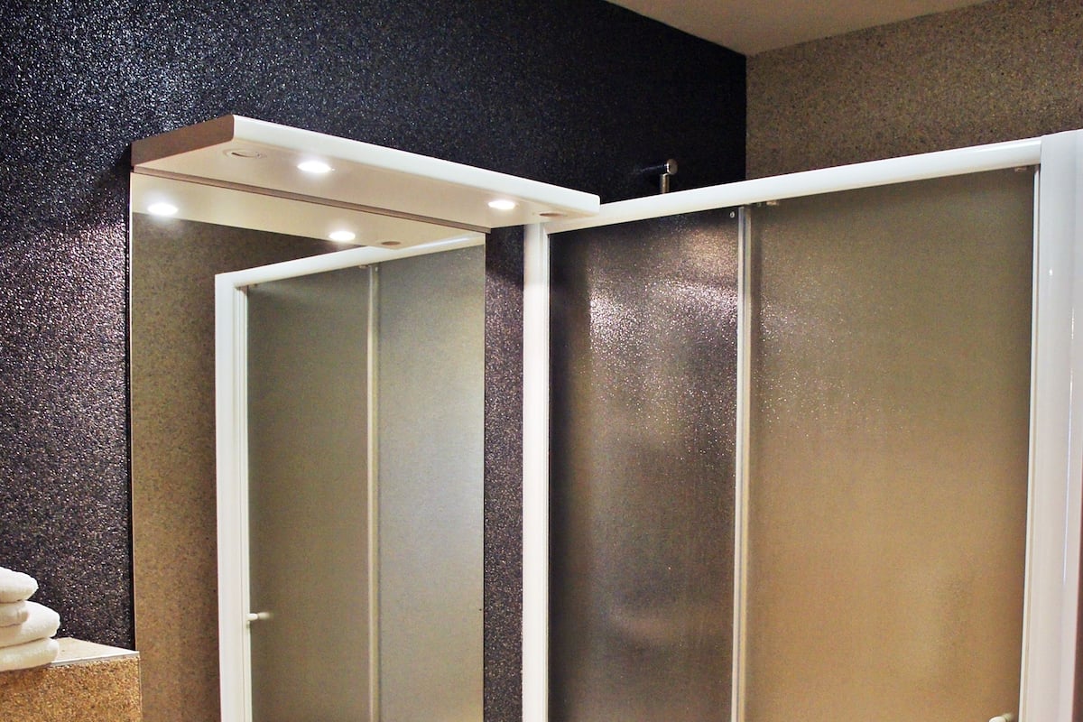 family room | bathroom | shower, free toiletries, hair dryer, bathrobes