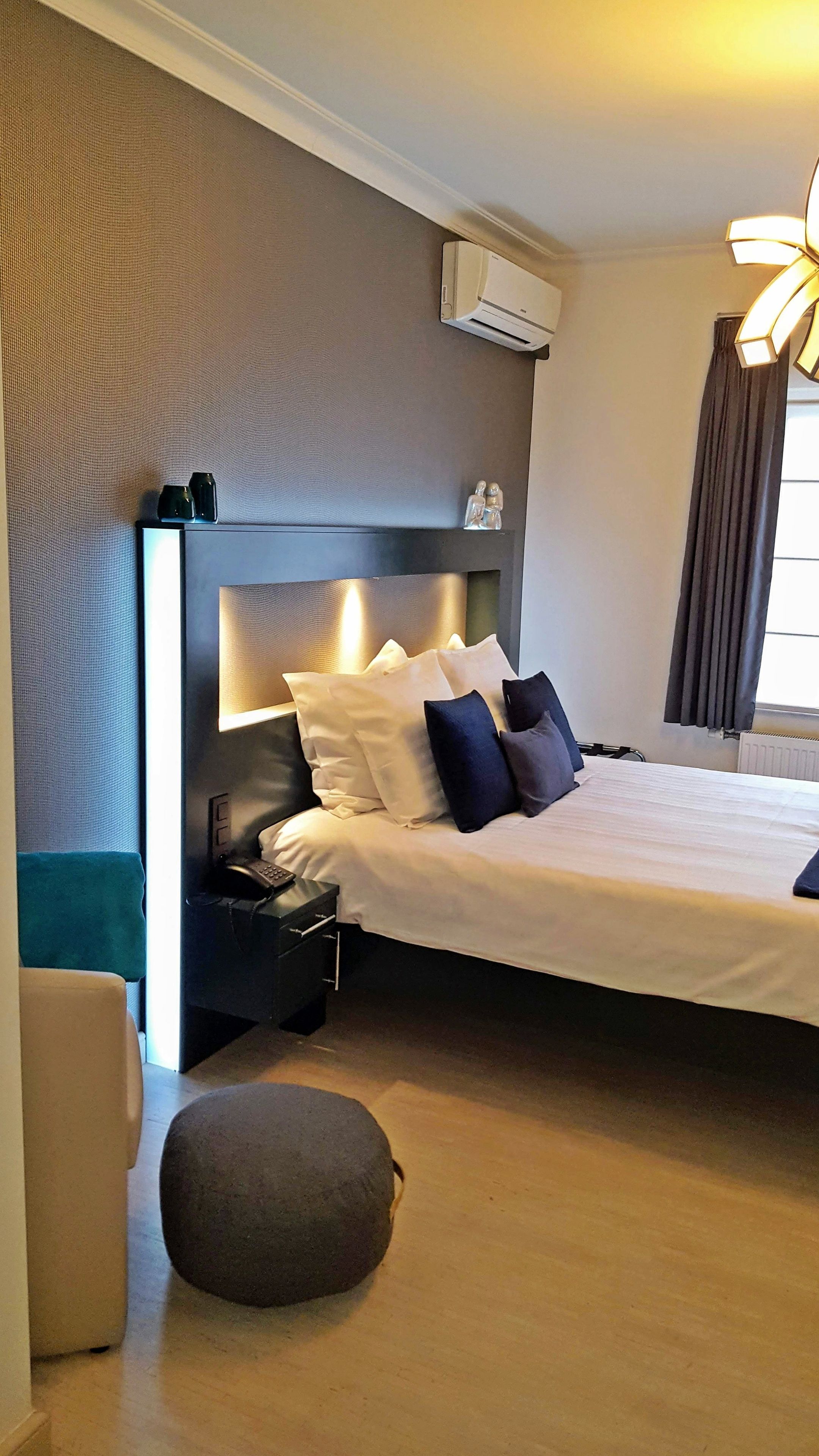 family room | pillow-top beds, in-room safe, blackout curtains, soundproofing