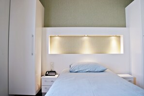 Kamar Single | Bantalan ekstra lembut, brankas, kedap suara, dan setrika/meja setrika