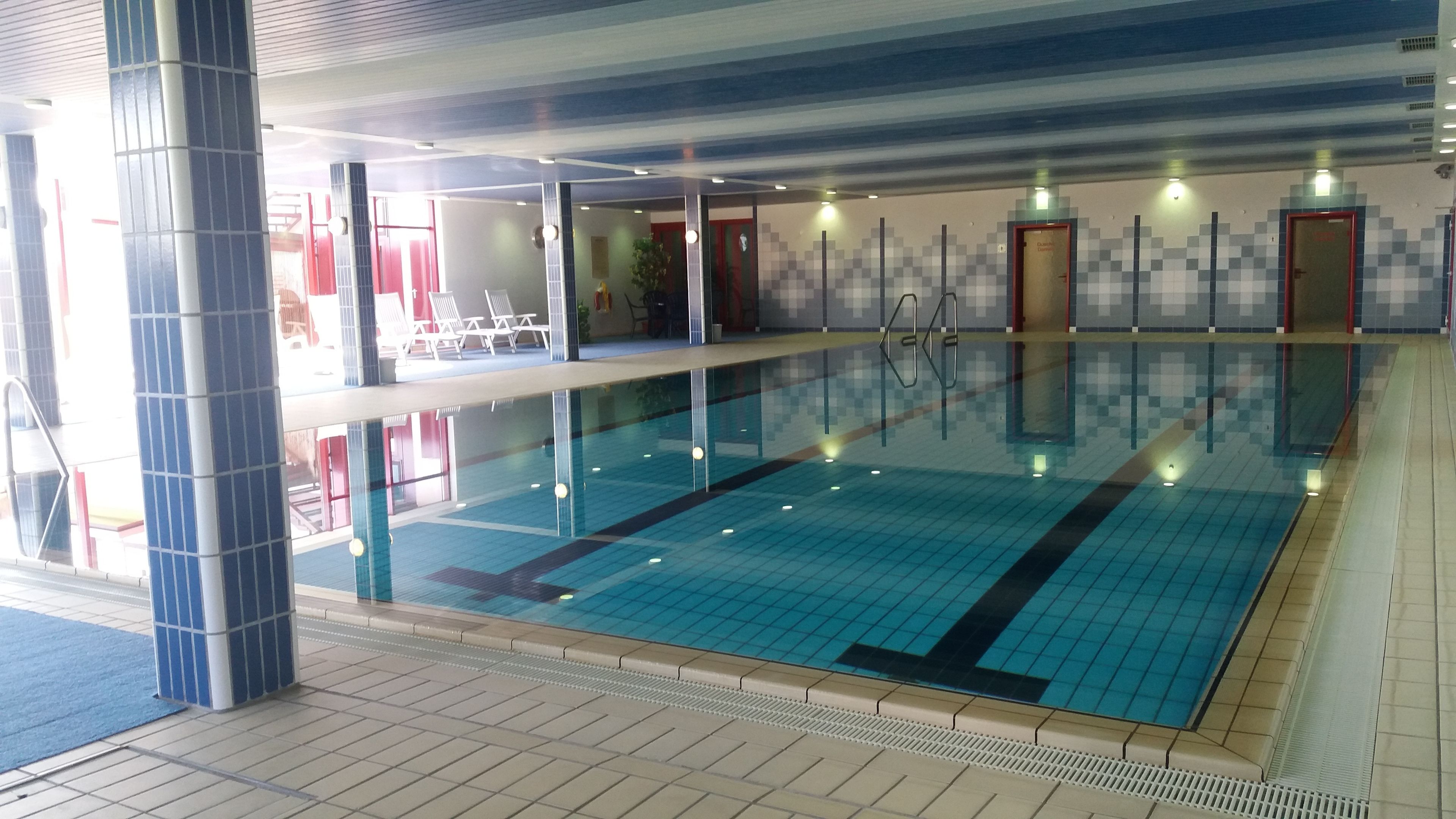 indoor pool, open 6:30 am to 10 pm, pool loungers