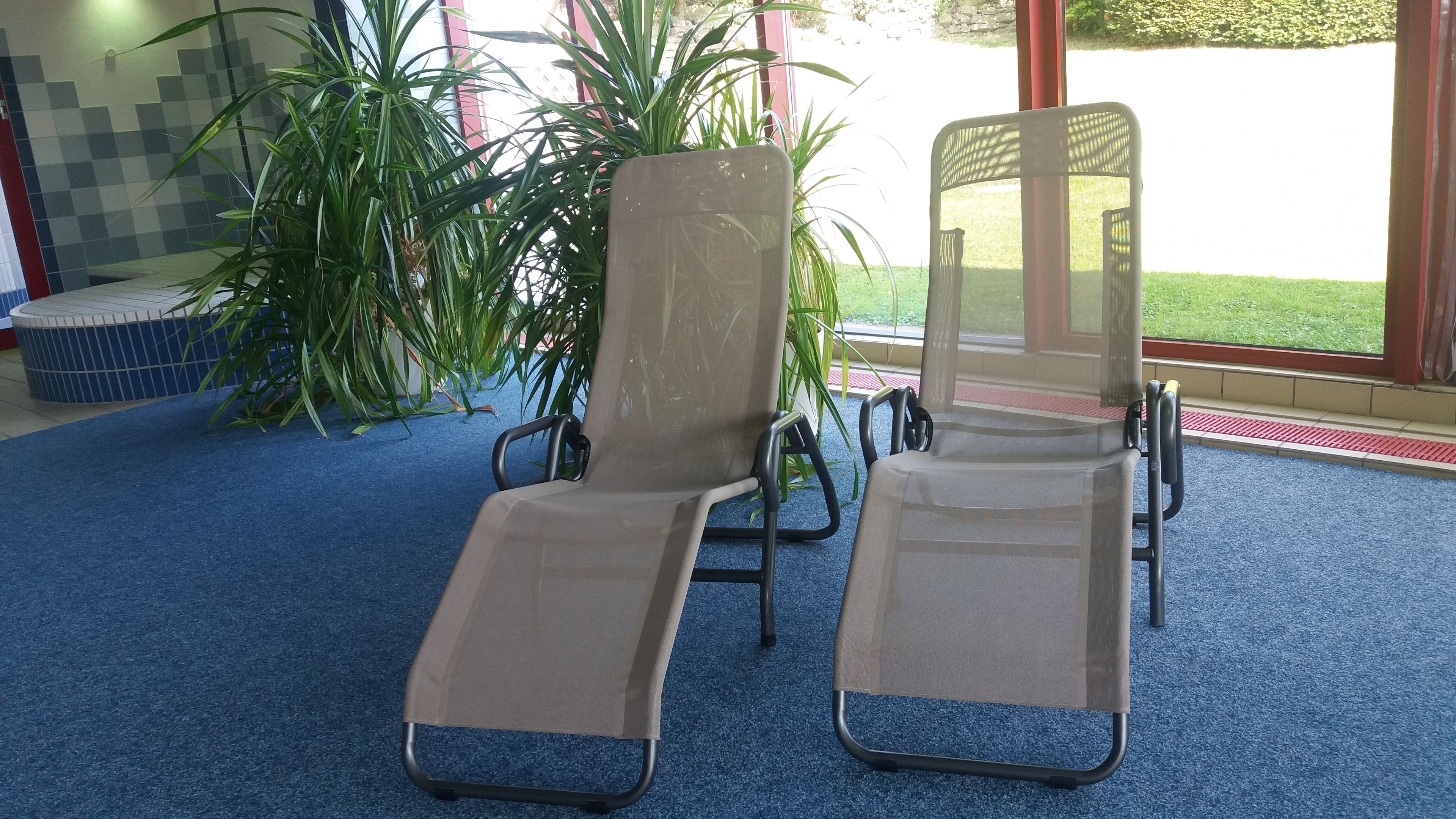 indoor pool, open 6:30 am to 10 pm, pool loungers