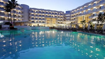 Indoor pool, outdoor pool, open 10:00 AM to 7:00 PM, pool umbrellas