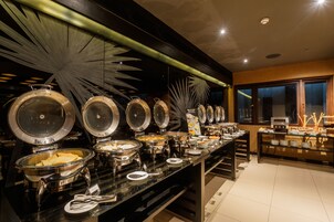 Daily buffet breakfast (USD 13 per person)