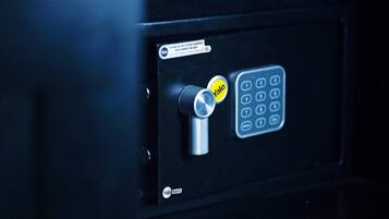 A Yale safe with a combination dial and keypad.