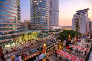 Breakfast, lunch served; international cuisine, al fresco dining
