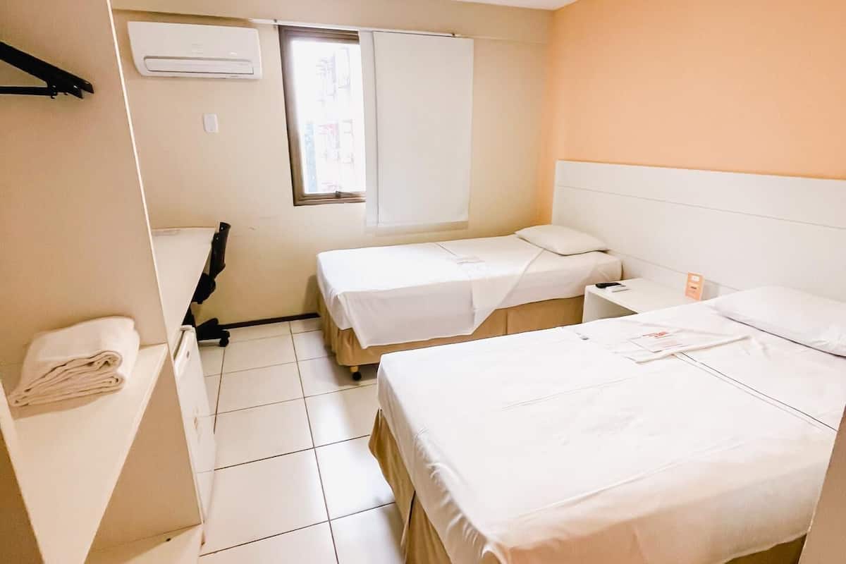 Minibar, desk, blackout curtains, iron/ironing board