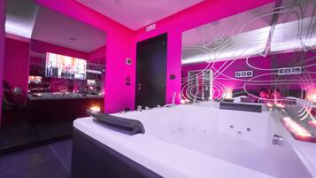 Suite, Bathtub | Minibar, in-room safe, individually decorated, individually furnished