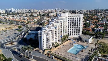 Experience the urban oasis at this hotel, featuring a rooftop pool and a tranquil atmosphere amidst the city's vibrant energy.