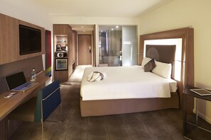 Enjoy a comfortable stay with a large bed, desk, and flat-screen TV in this stylish room.