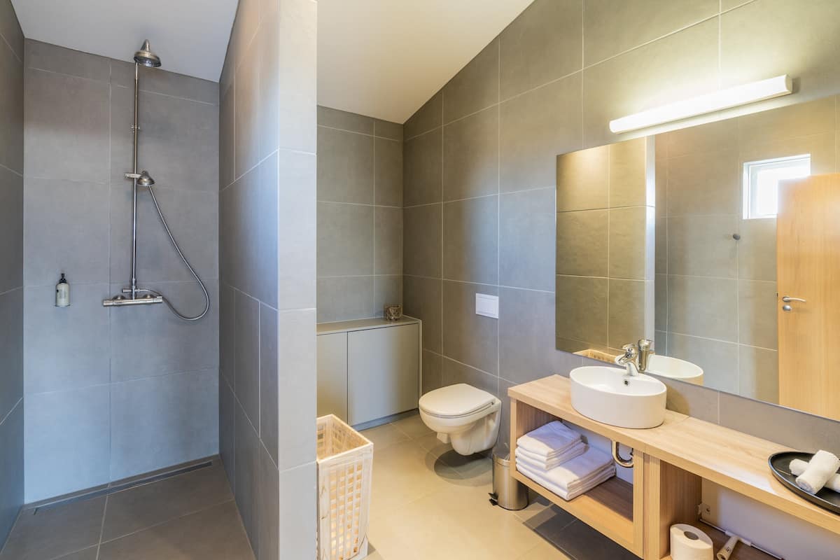 suite with private hot tub | bathroom | hair dryer, towels, soap, shampoo