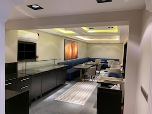 Breakfast, lunch, dinner served; international cuisine