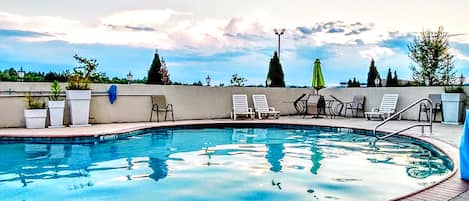 Outdoor pool, open 9 AM to 9 PM, pool umbrellas, sun loungers
