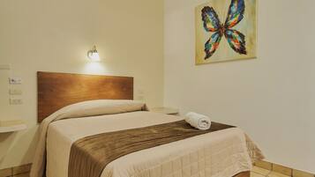 Habitacion Superior 1 cama matrimonial con aire acondicionado | Een bureau, gratis wifi, beddengoed