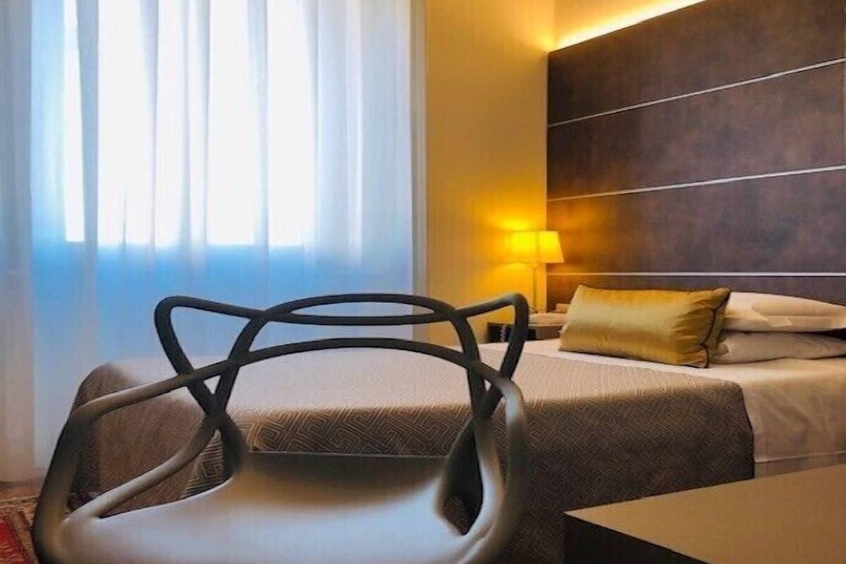 superior single room | in-room safe, desk, laptop workspace, soundproofing