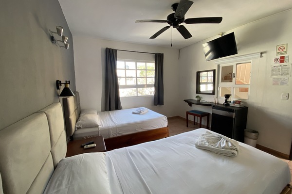 Standard Triple Room (with Fan and AC) | In-room safe, desk, WiFi (free), bed sheets