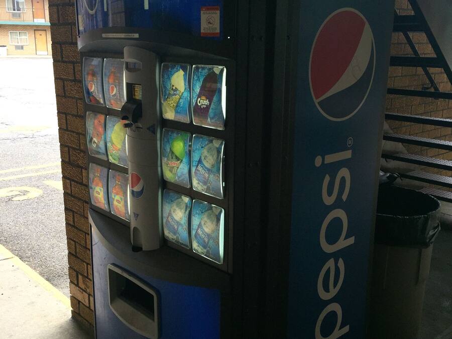 A Pepsi vending machine with multiple drink options.