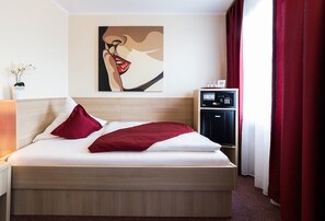 Literie hypoallergénique, minibar, coffres-forts dans les chambres