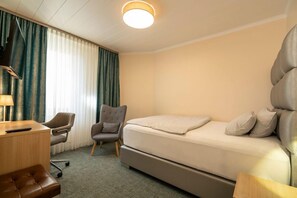 Hypo-allergenic bedding, minibar, in-room safe, desk