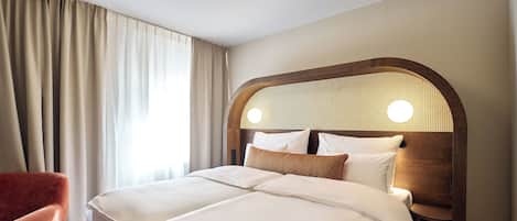 Minibar, in-room safe, individually decorated, desk