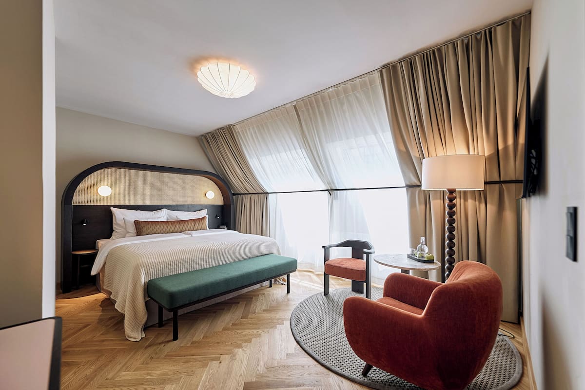 Small Double Room | Minibar, in-room safe, individually decorated, desk