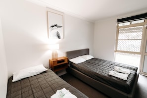Desk, blackout curtains, iron/ironing board