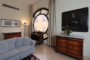 Junior Suite | Living room | 30-inch TV with satellite channels