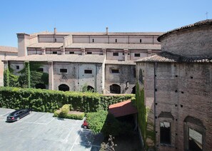 Stunning historic building with a traditional courtyard and arched roof.
