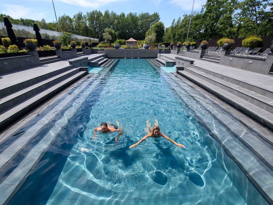 Indoor pool, outdoor pool, pool umbrellas, sun loungers