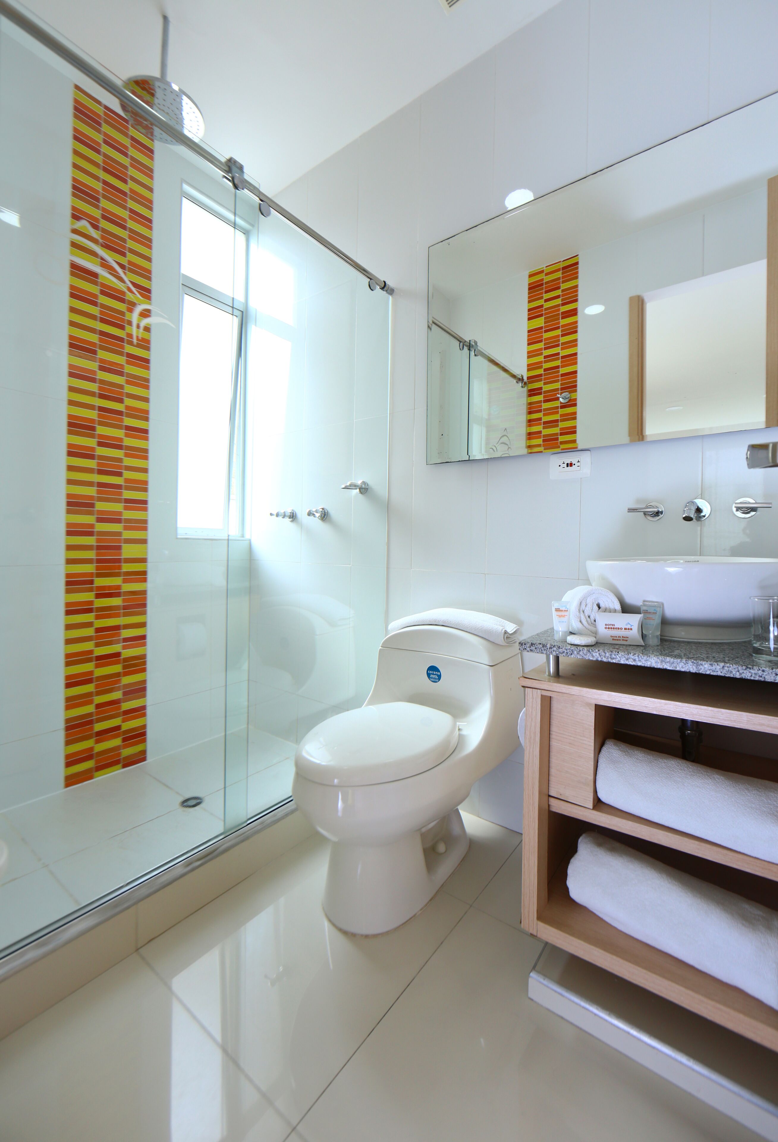 shower, rainfall showerhead, hair dryer, towels