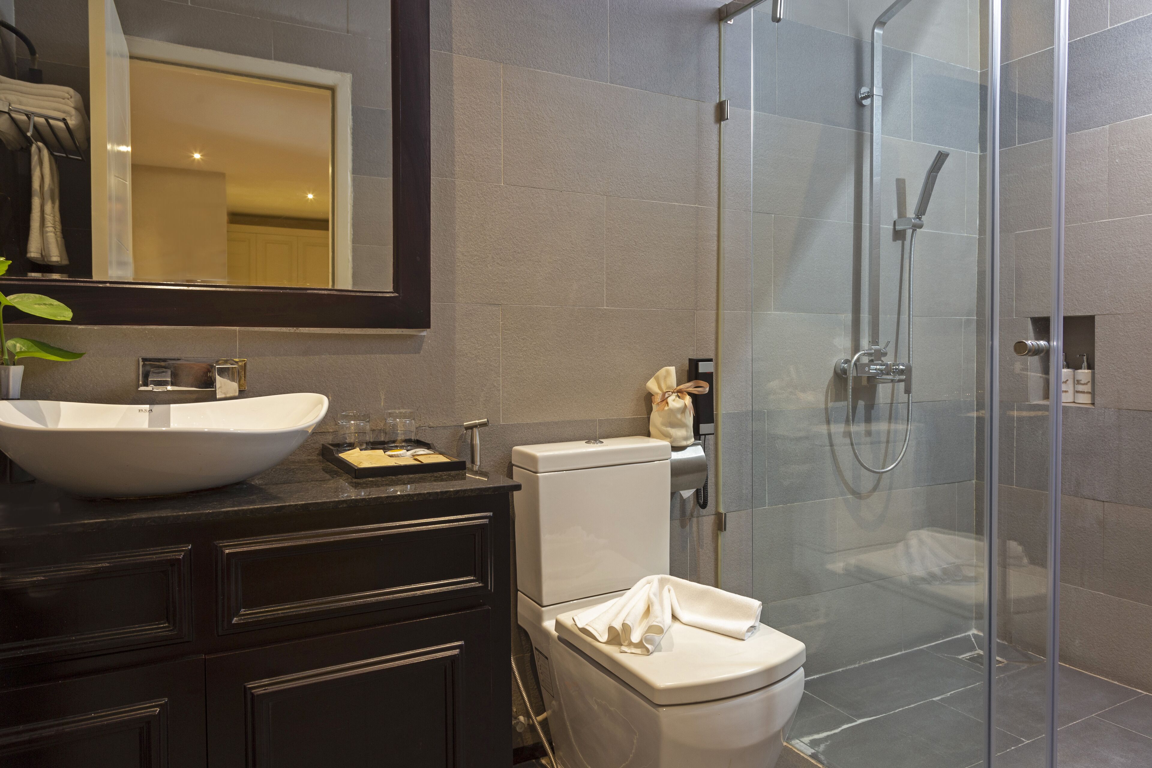 separate bathtub and shower, deep-soaking bathtub, rainfall showerhead