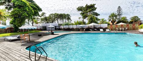 Outdoor pool, pool umbrellas, pool loungers