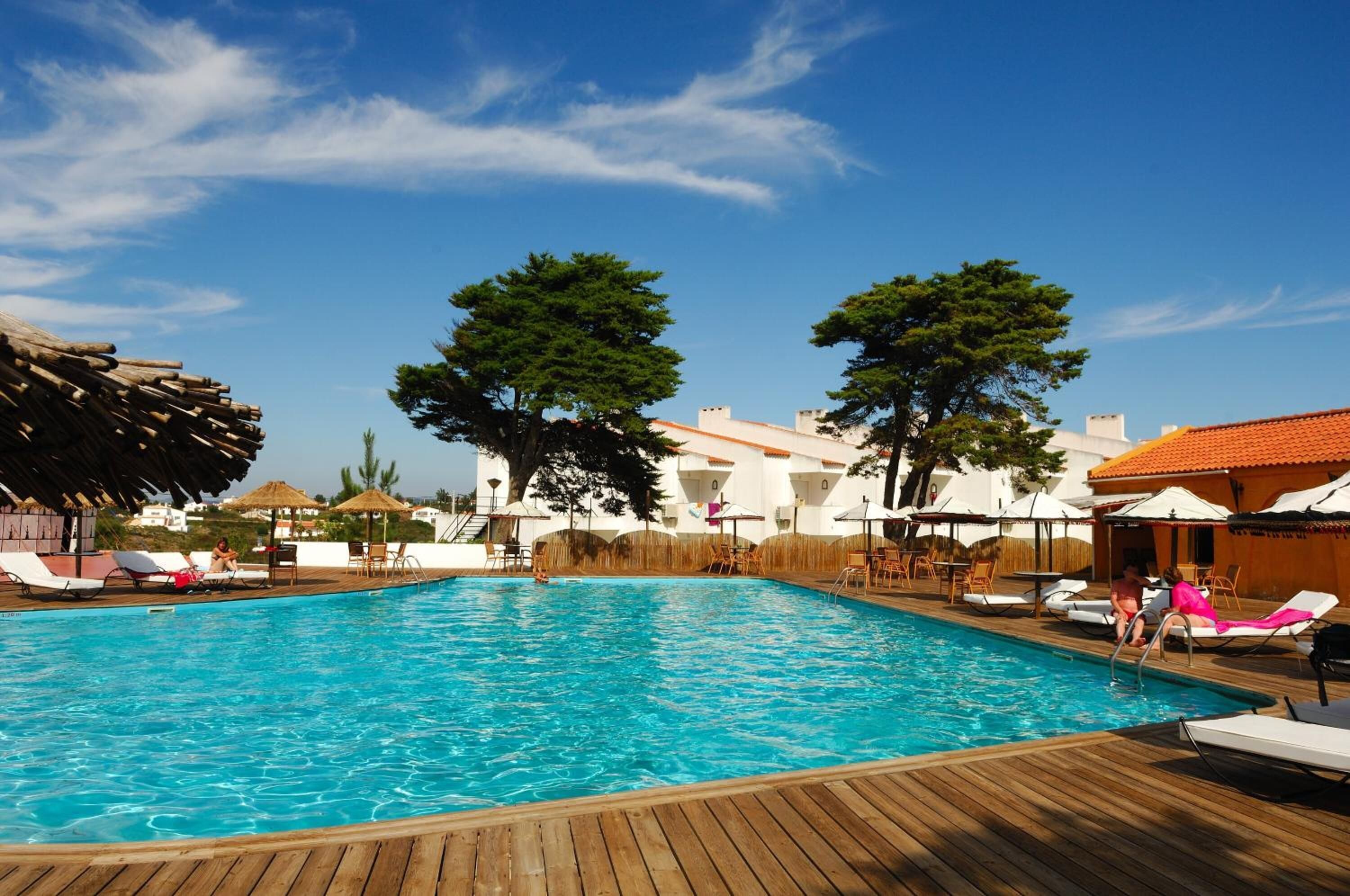 outdoor pool, pool umbrellas, pool loungers