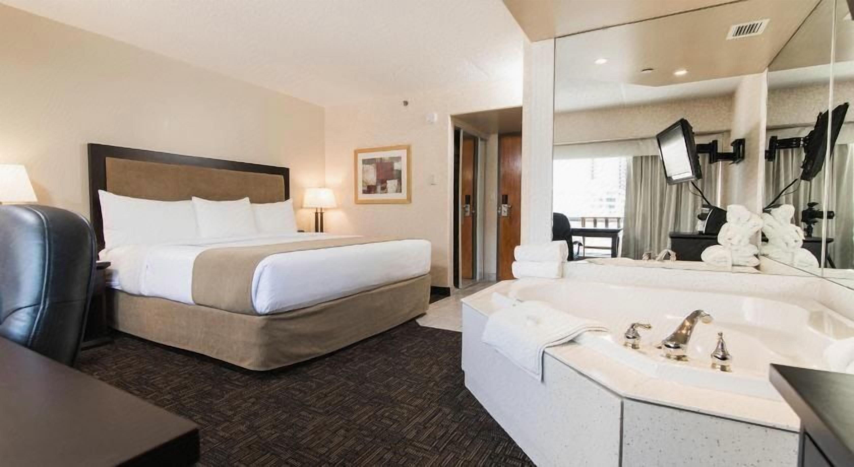 Pillowtop beds, desk, laptop workspace, blackout drapes