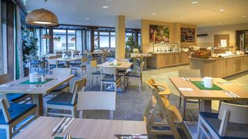 Daily buffet breakfast (EUR 18 per person)