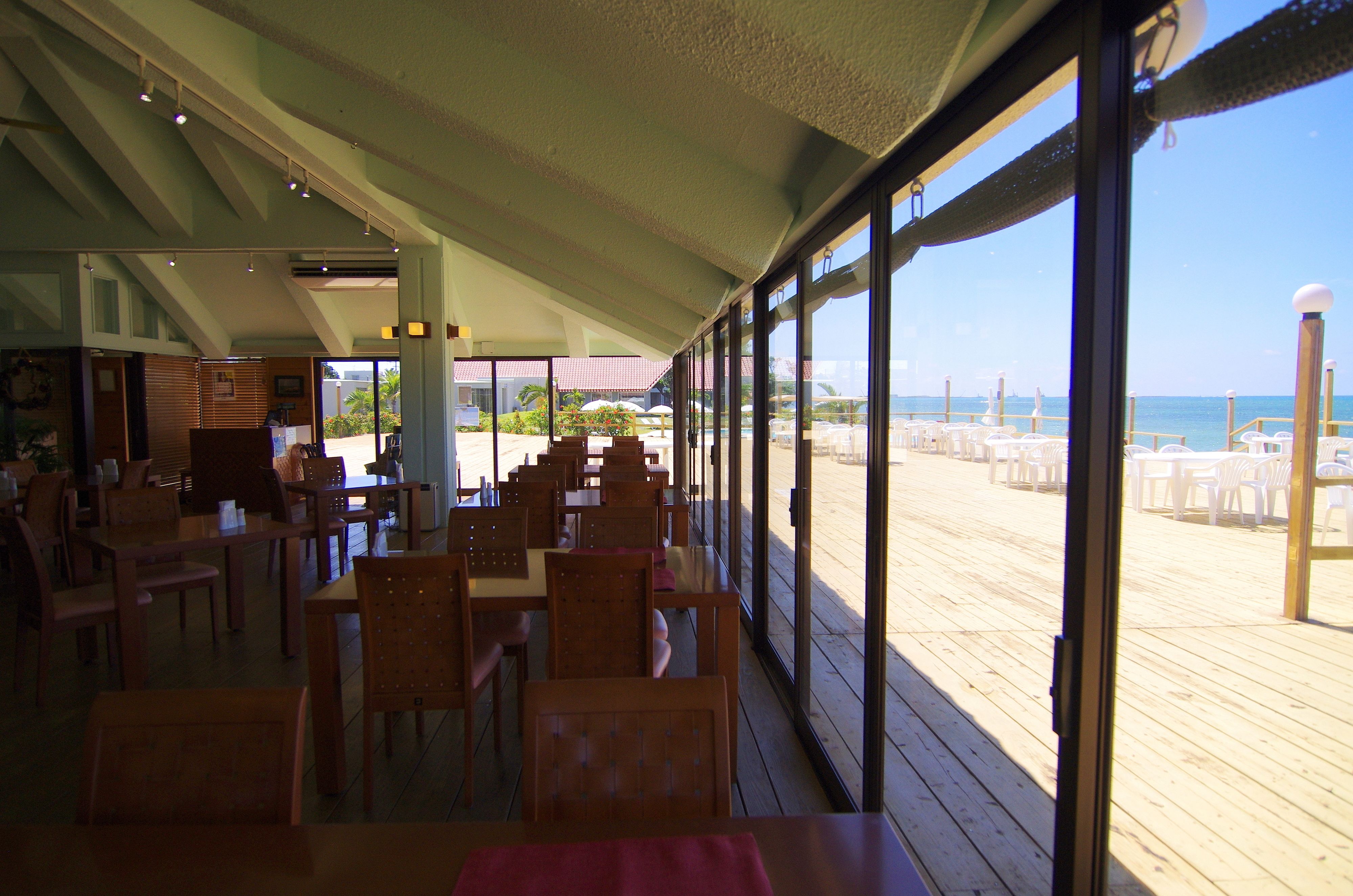 A restaurant with a view of the beach.