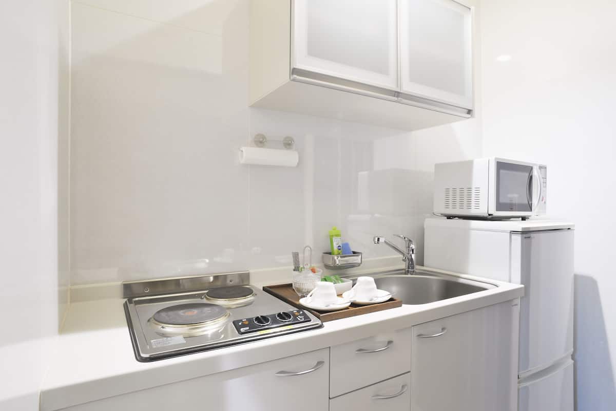 full-sized fridge, microwave, coffee/tea maker, electric kettle