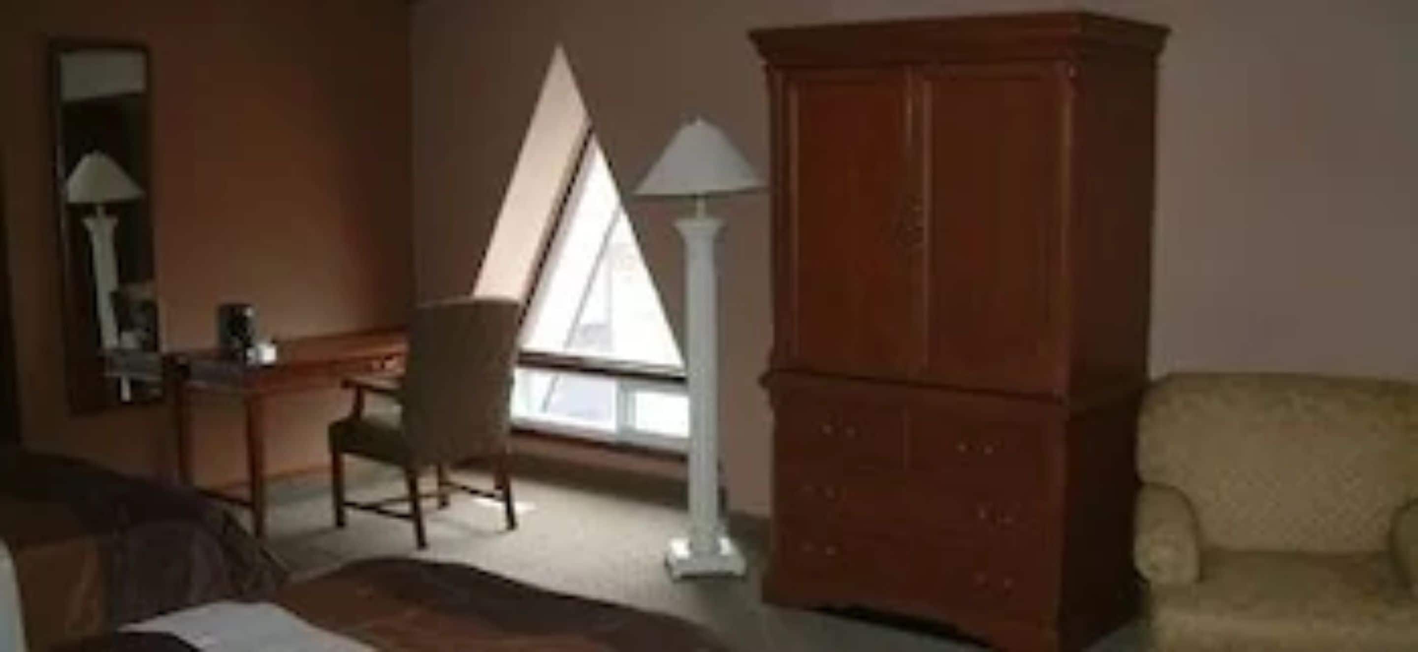 standard room, 2 queen beds | living area | led tv