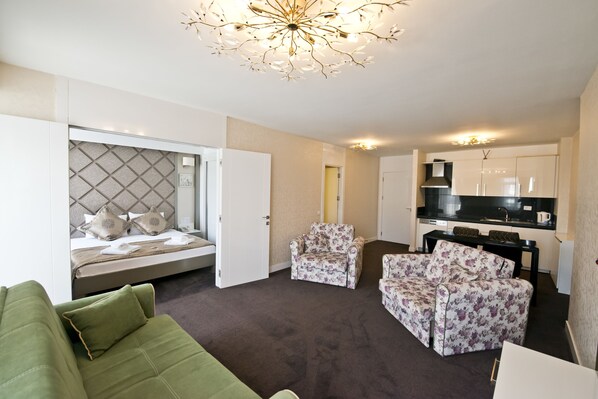 Suíte | Área de estar | TV de tela plana