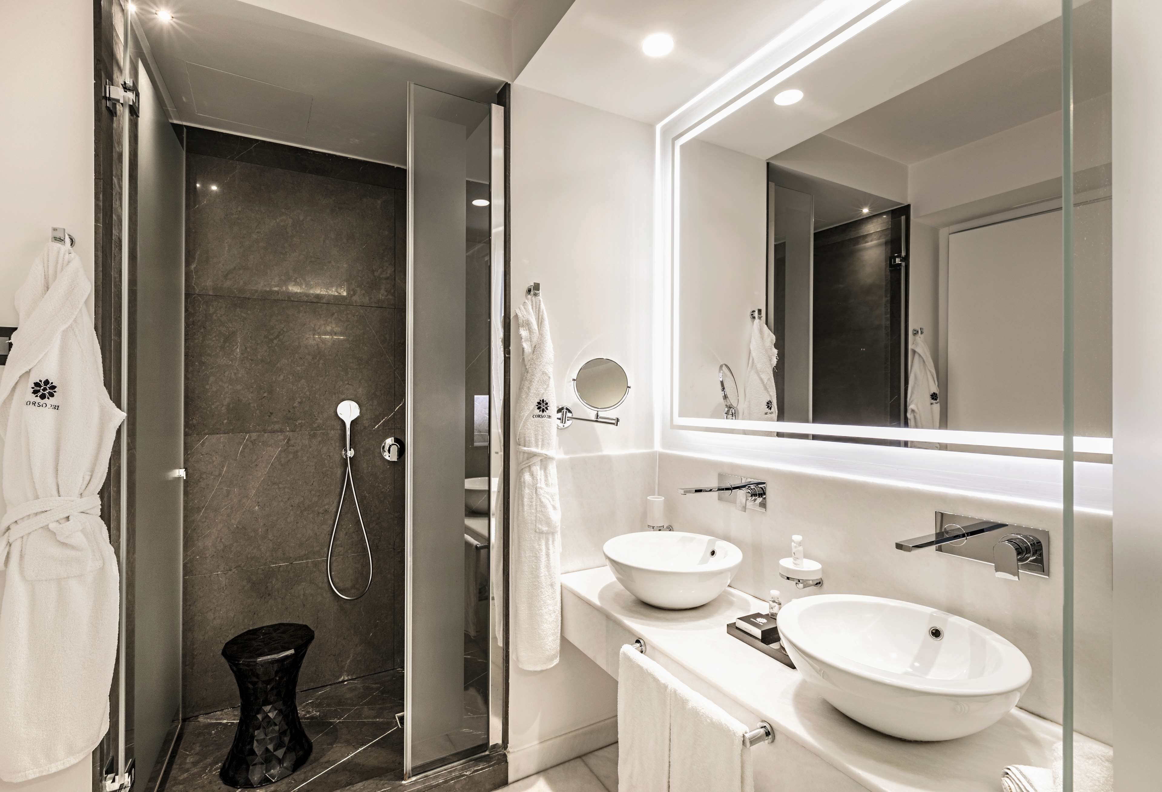 family suite | bathroom | shower, rainfall showerhead, designer toiletries, hair dryer
