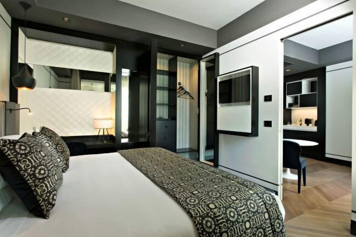 Premium bedding, down duvets, memory-foam beds, minibar