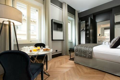 Premium bedding, down comforters, memory foam beds, minibar