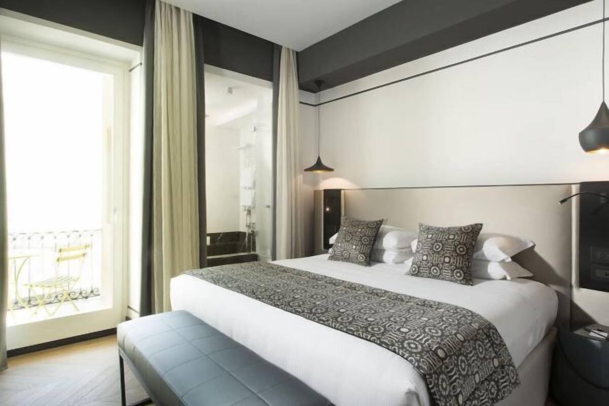 Premium bedding, down duvets, memory-foam beds, minibar