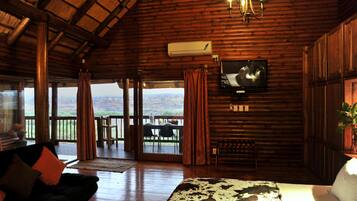Family Cabin, 2 Bedrooms, Balcony, River View (Martial Eagle Unit 9) | Premium bedding, individually decorated, individually furnished