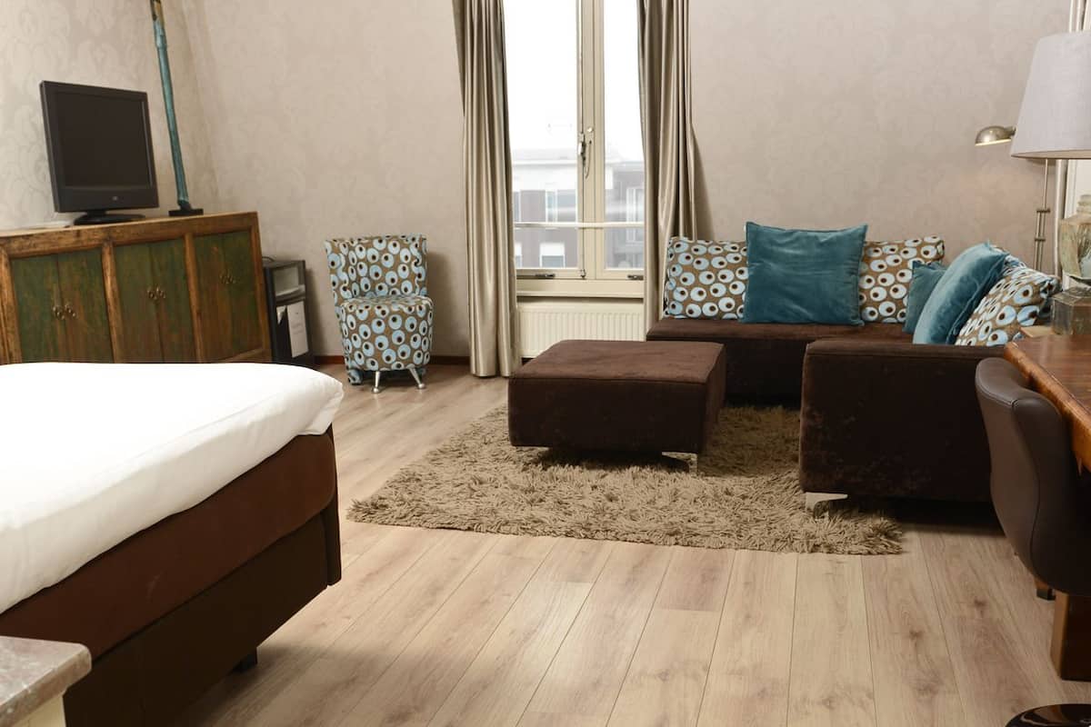 luxury room, 1 queen bed | living area | lcd tv