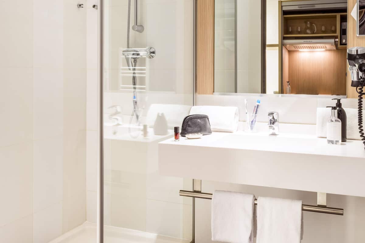Eco-friendly toiletries, hair dryer, towels