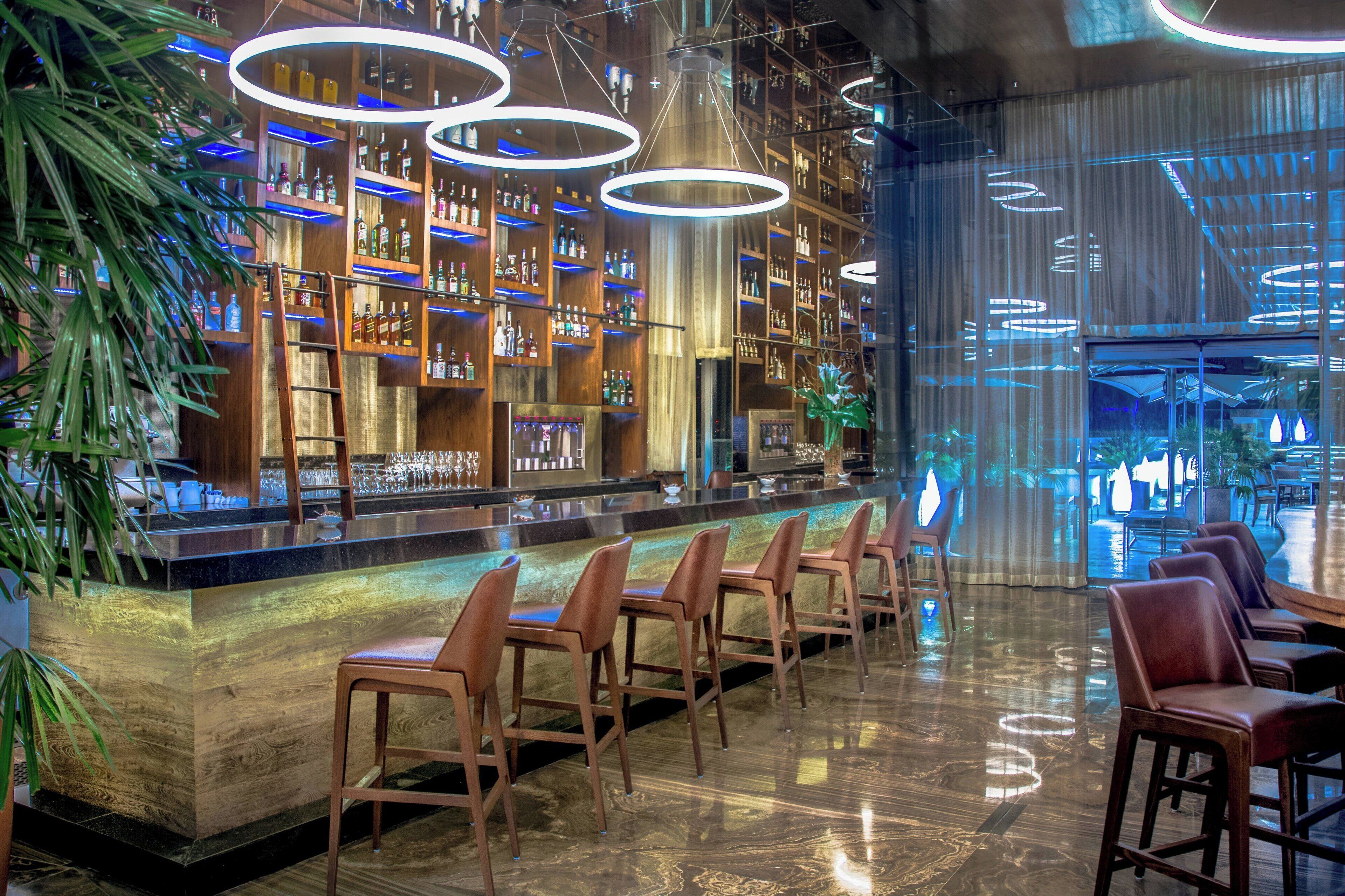 poolside views, serves lunch, dinner and happy hour