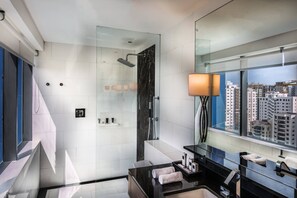 Separate tub and shower, rainfall showerhead, free toiletries